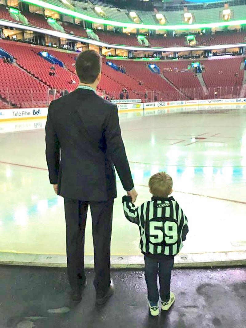 National Hockey League (NHL) linesman Steve Barton is seen here with his son, Lochlan. (Photo submitted)