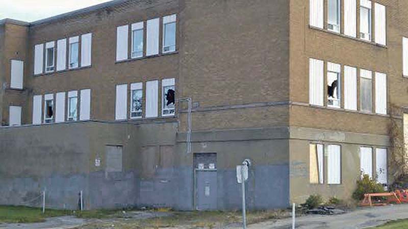 Town wants at least $50,000 for abandoned Christ-Roi school