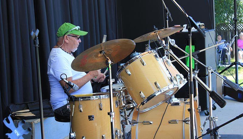 Councillor André “Cham” Chamaillard playing the drums in Bob Portelance’s band.