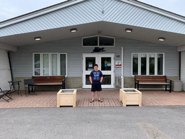 Ten-year-old builds new flower boxes for Heritage Lodge and now, the orders keep coming in for more