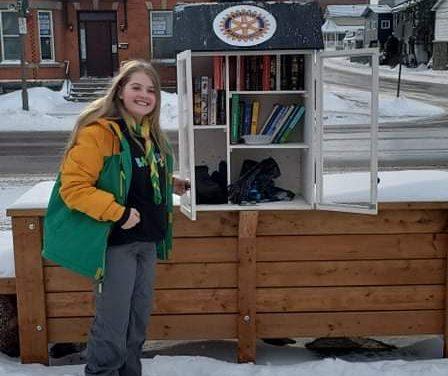 Local Scout supplying scarves and mittens for those in need