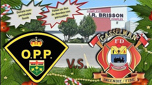 Charity hockey game between Russell County OPP and Casselman Fire Department December 28